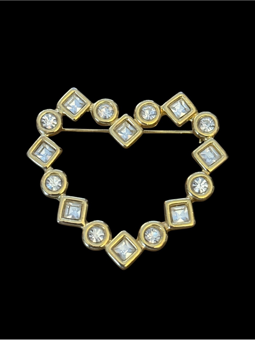 Vintage gold tone rhinestone open heart brooch